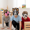Farm animal masks worn during creative play