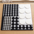 Floor protector pad sheets lying flat on a home table