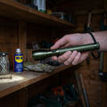 FX Pro torch being used to check a shed shelf