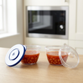 Mini food pots in a kitchen meal-preparation setting