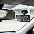 Parent rear view mirror fitted inside a parked car