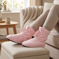 Snuggle Bootees worn while relaxing at home
